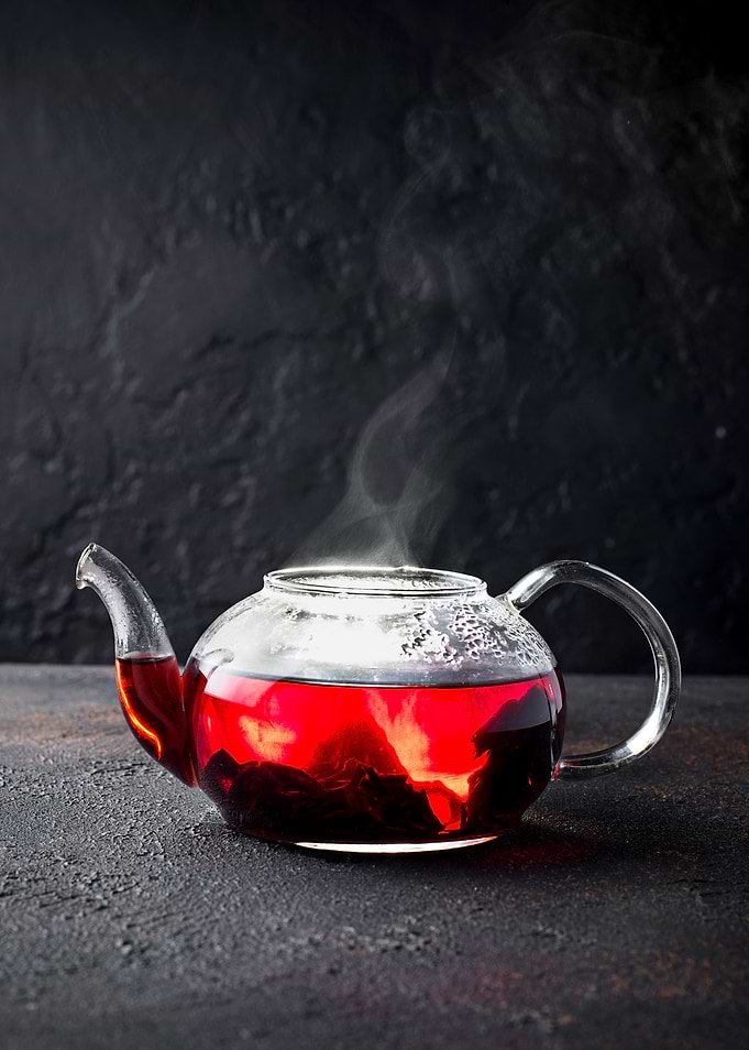 Glass Teapot with Red Tea