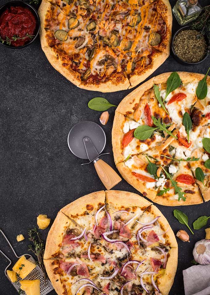 Three Delicious Pizzas