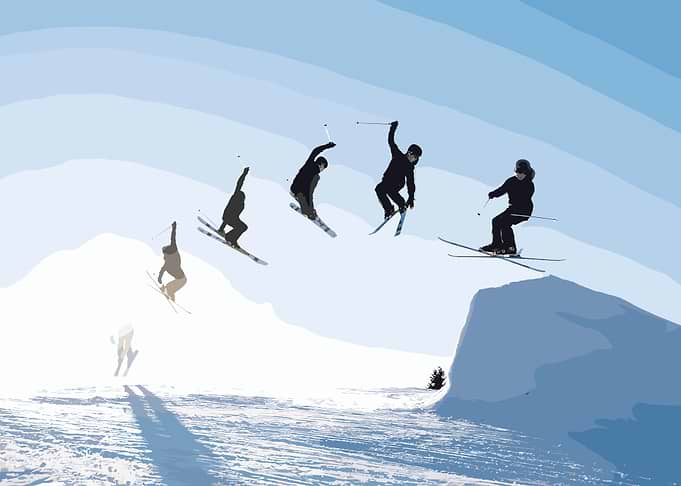 Skiers Jumping in Snowy Mountain Landscape