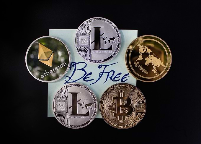 Cryptocurrency Coins with 'Be Free' Message