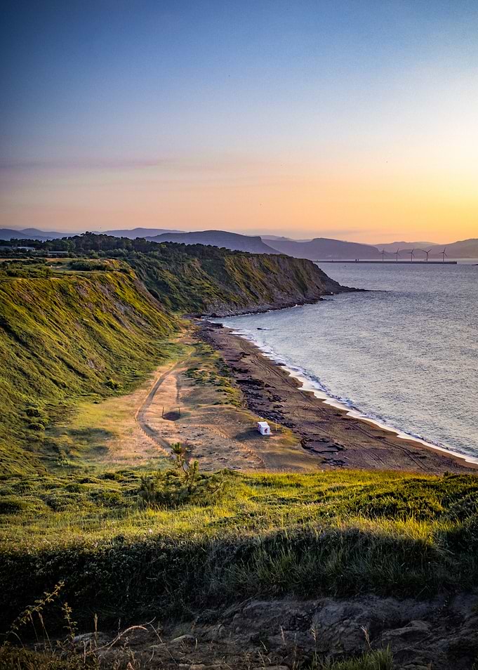 Coastal Cliffside at Sunset