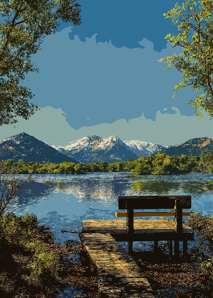 Lake view with bench and mountains