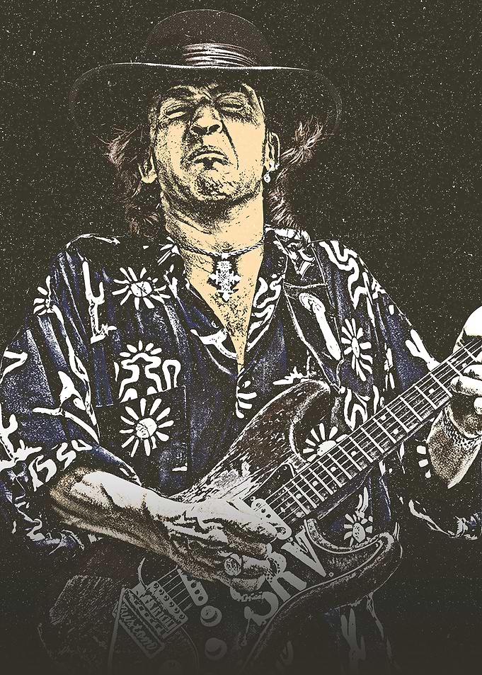 Stevie Ray Vaughan plays his guitar with his eyes closed