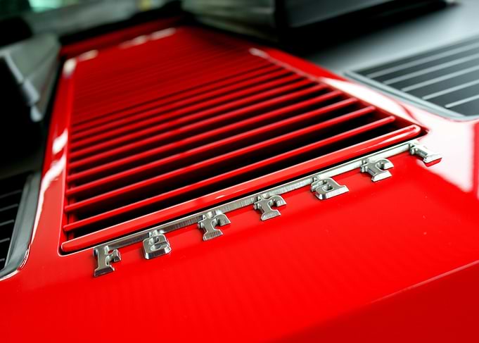 Red Ferrari Engine Cover Close-Up