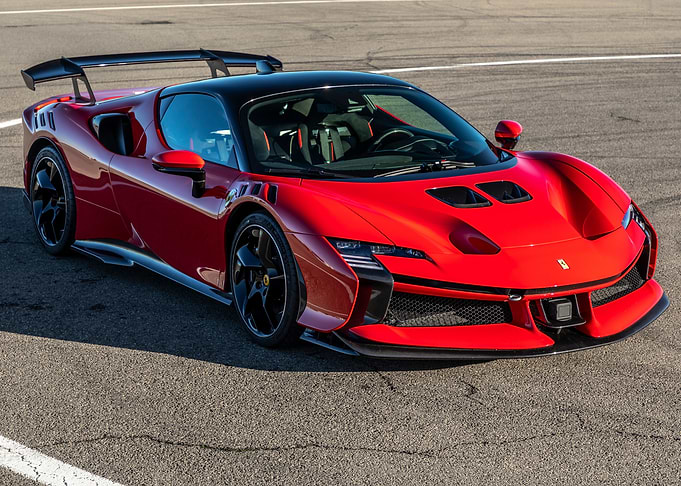 Red Ferrari on Asphalt