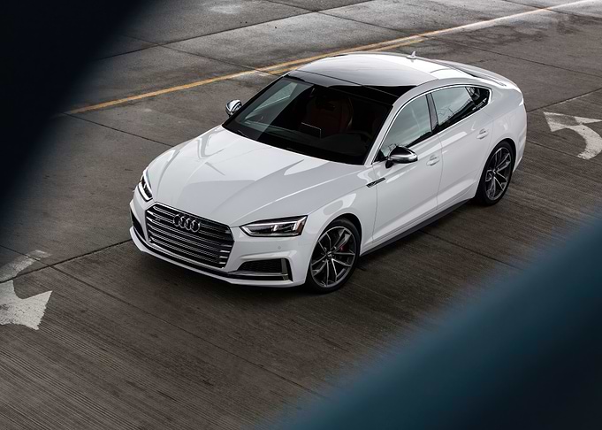 White Audi S5 on Concrete