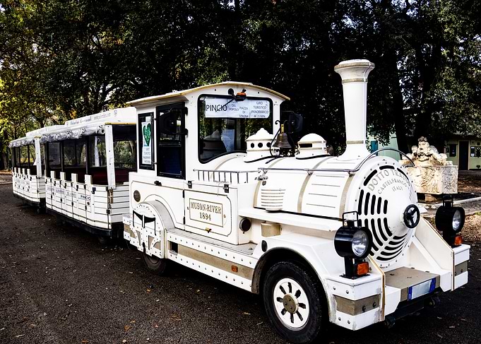 White Tourist Train in Park Setting