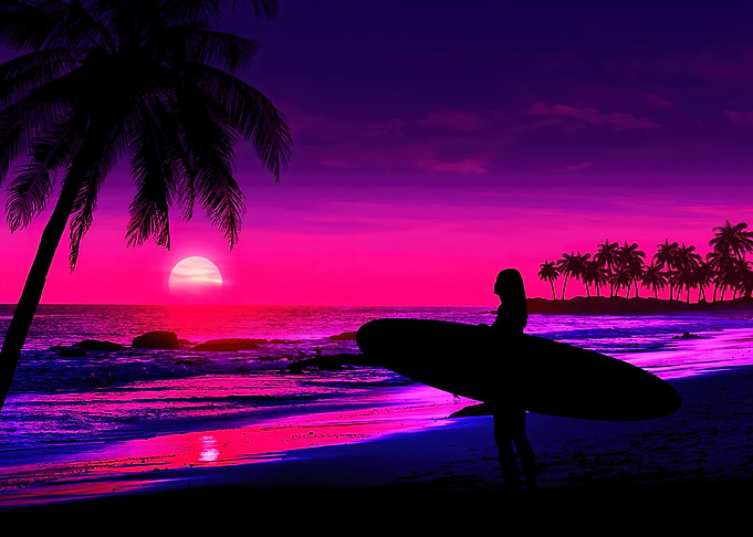 Surfer sunset beach
