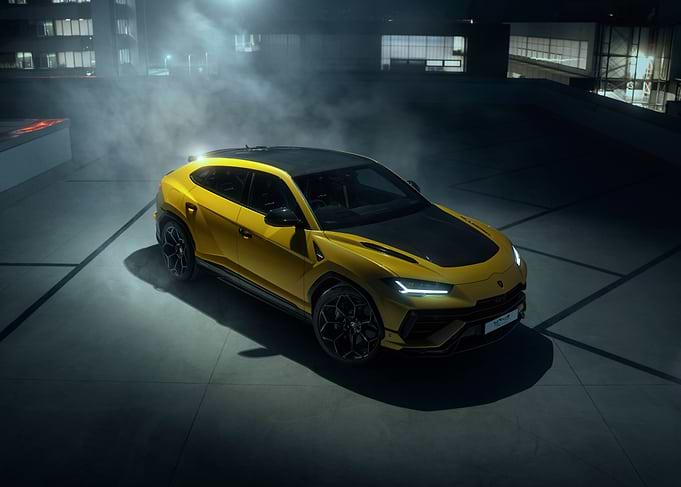 Yellow Lamborghini Urus SUV in Fog