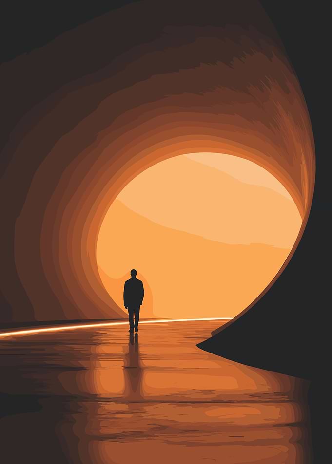 Man walking through tunnel of light