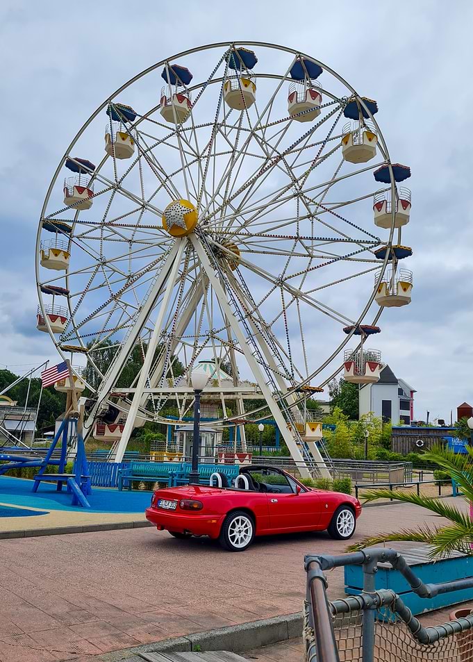 Miata and Ferris Wheel in an amusement park