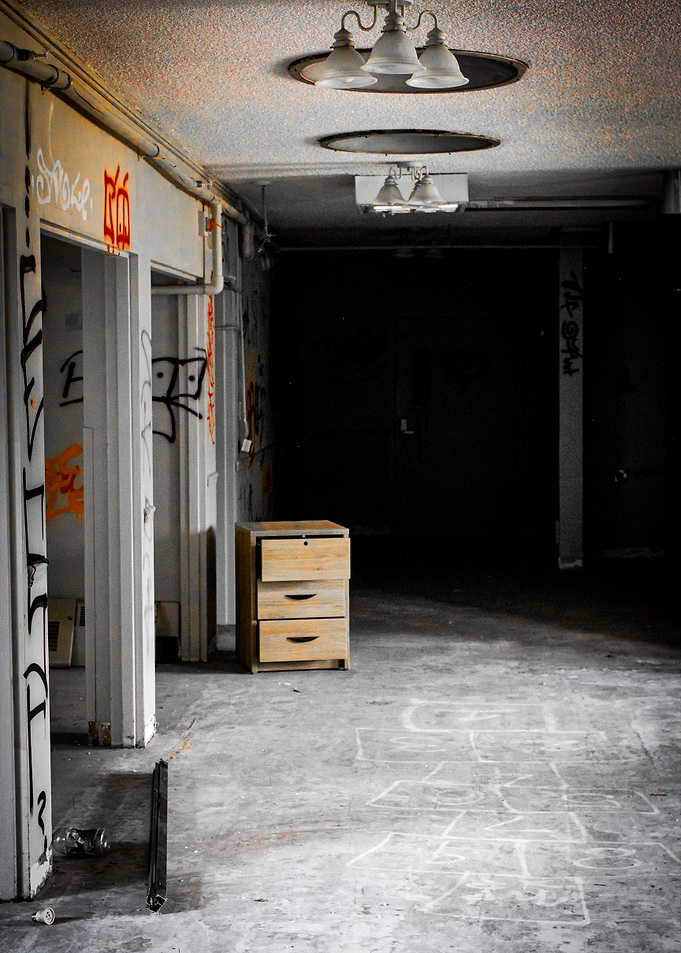 Abandoned Building Interior with Dresser