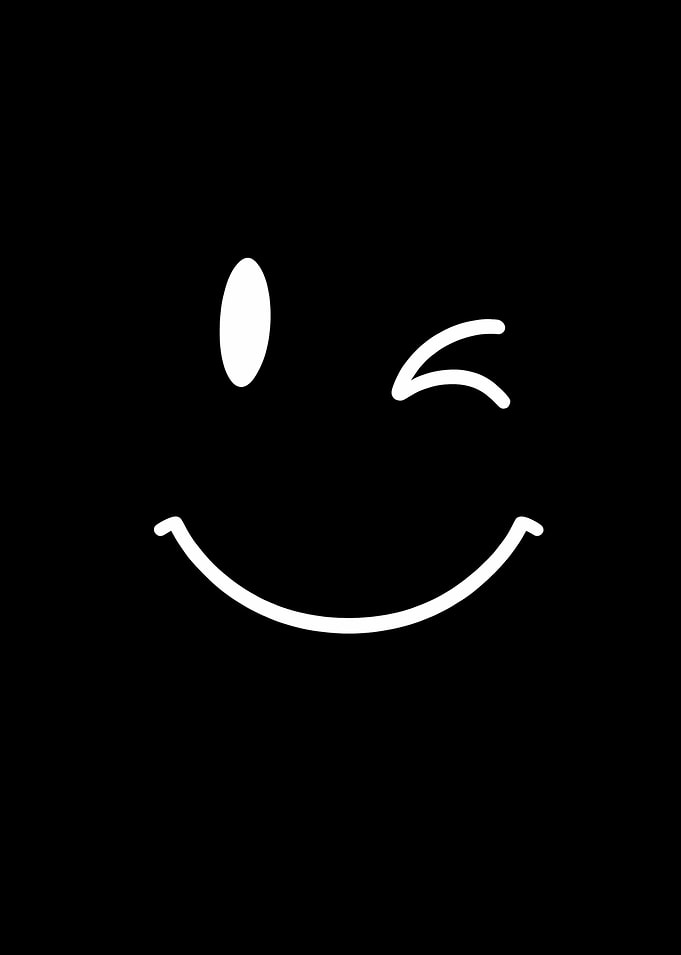Winking Smiley Face on Black Background