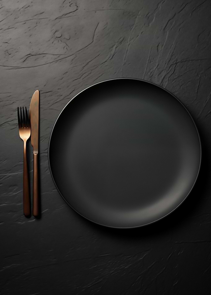 Elegant Black Plate with Golden Cutlery