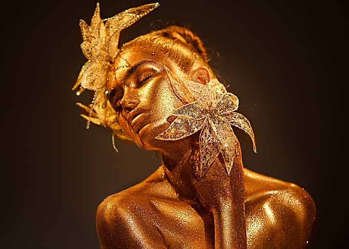 Golden Woman with Floral Adornments