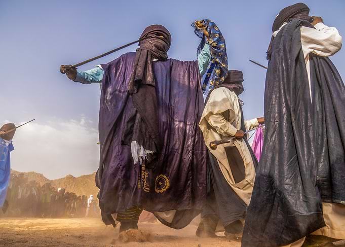 Tuareg men performing a traditional dance