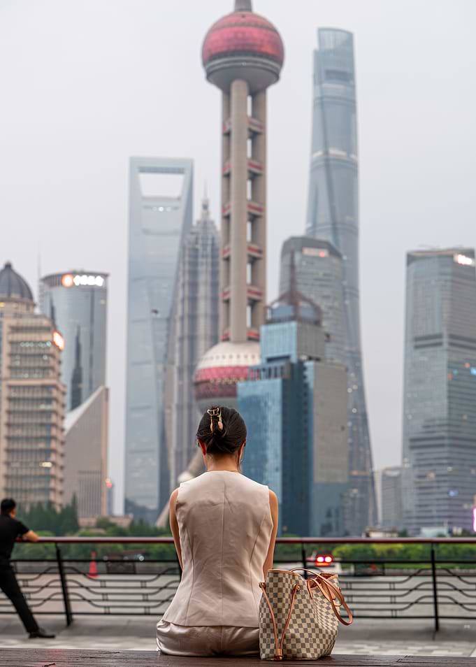 Woman Gazing at Shanghai Skyline
