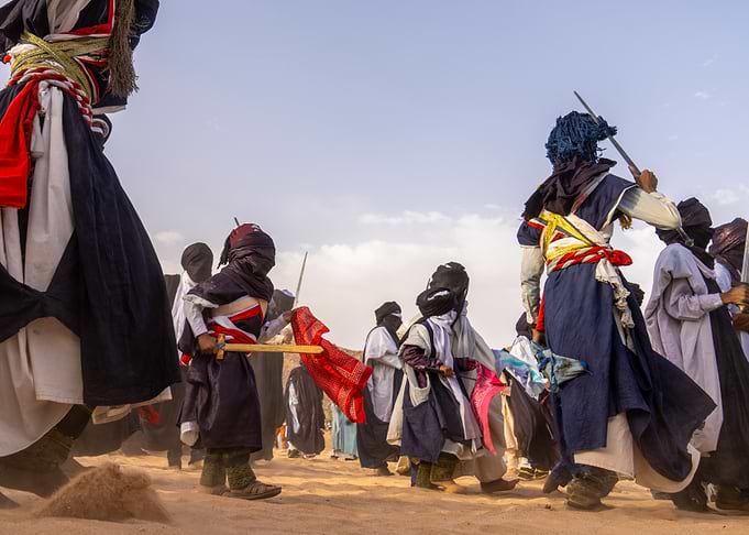 Tuareg people performing a traditional dance
