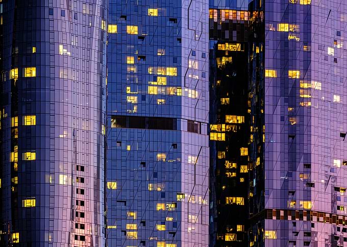 Modern Skyscraper Facade at Night