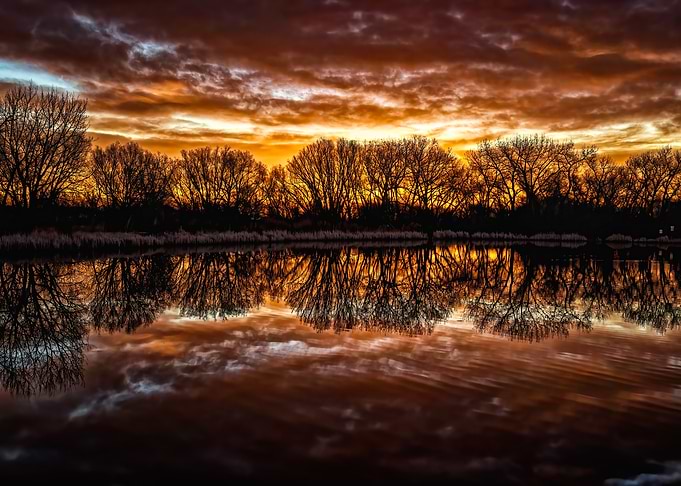 Colorful Sunrise Reflection on Water