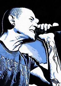 Chester Bennington singing into microphone