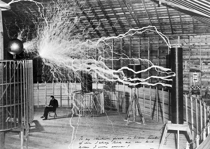 Nikola Tesla, with his equipment for producing high-frequency alternating currents (1901)