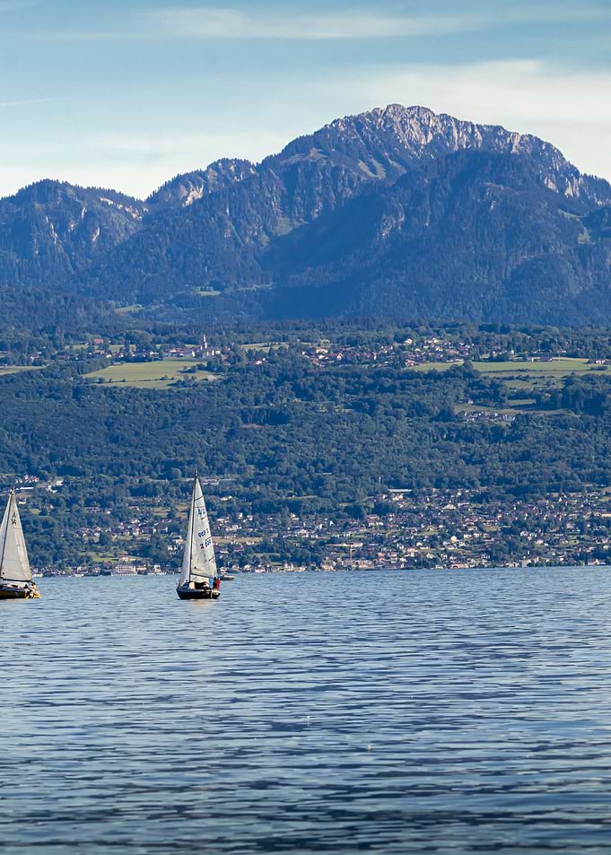 Sailboats on Leman Lake with Mountain Backdrop