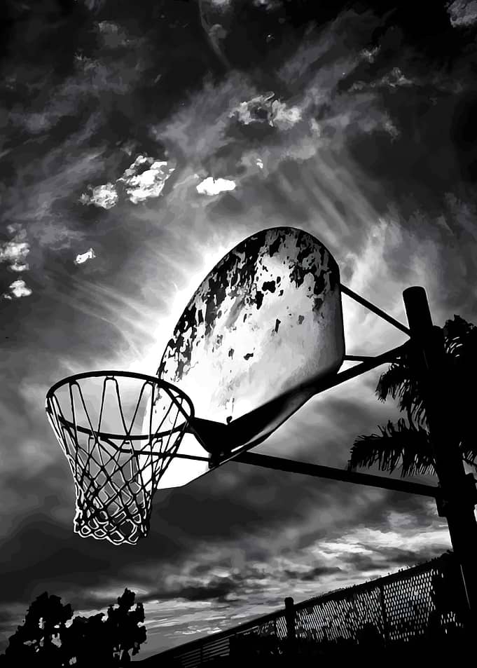 Basketball hoop against cloudy sky