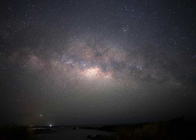 Milky Way over dark landscape