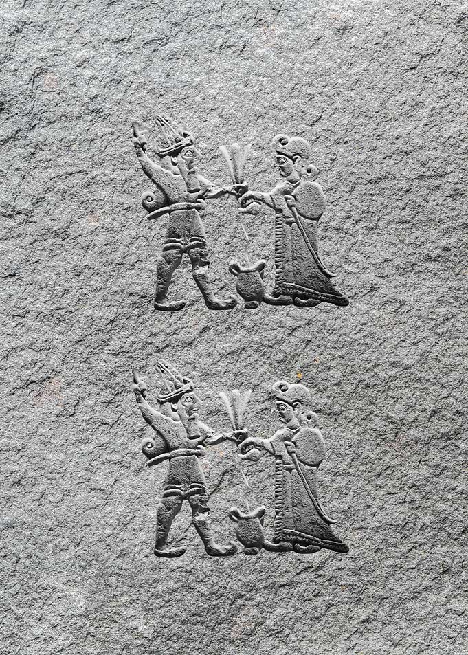 Ancient Stone Carving of Figures