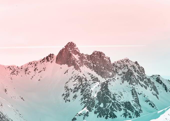 Snowy Mountain Peak with Vapor Trail