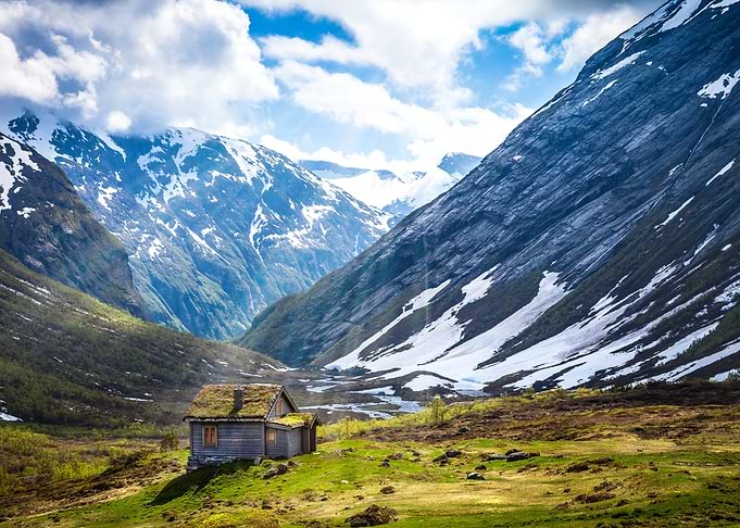 remote cabin in mountain valley