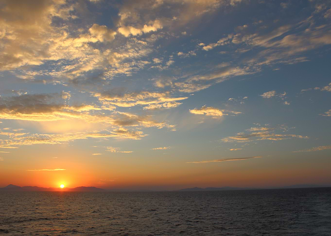 Ocean Sunset with Cloudy Sky
