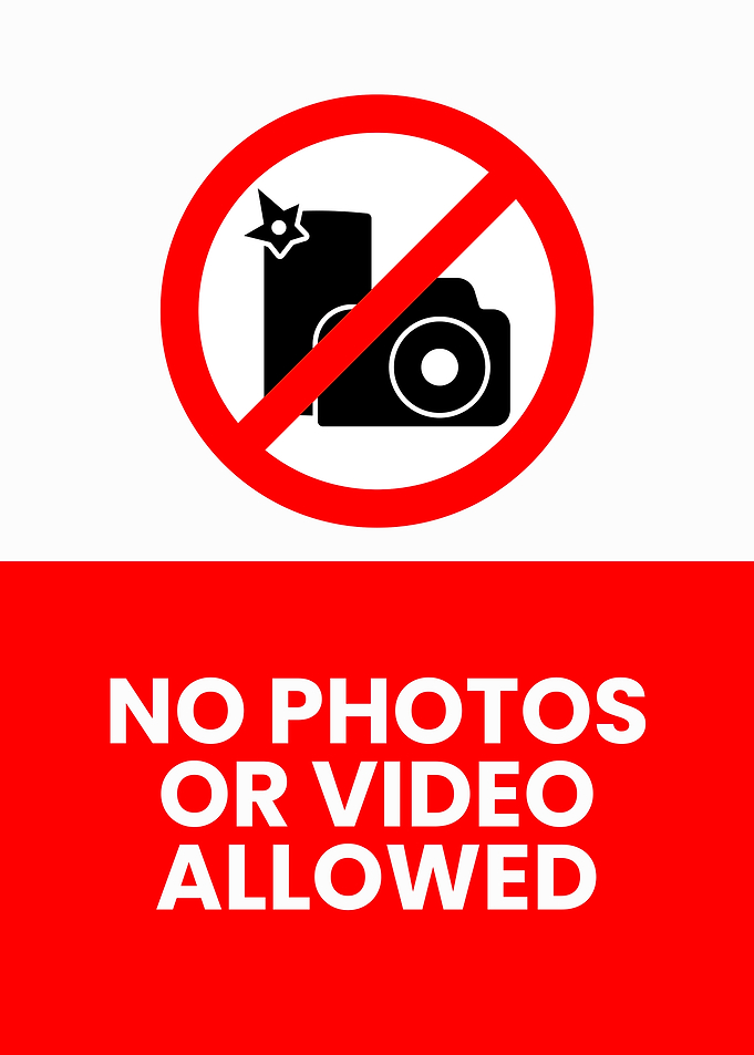 No Photos or Video Allowed Sign