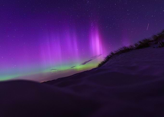 Aurora Borealis over the sand dunes of Amrum, Germany