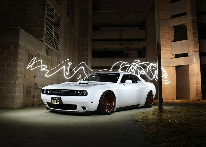 White Dodge Challenger with Light Trails