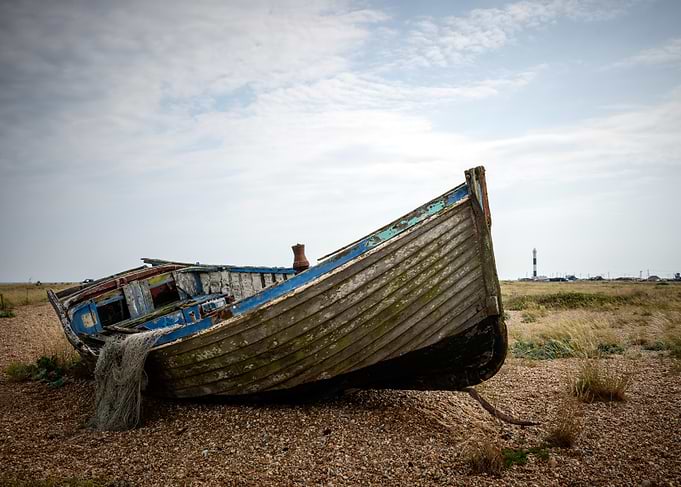 Abandoned Boat on Pebble Beach