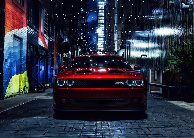 Red Dodge Challenger in Urban Alleyway