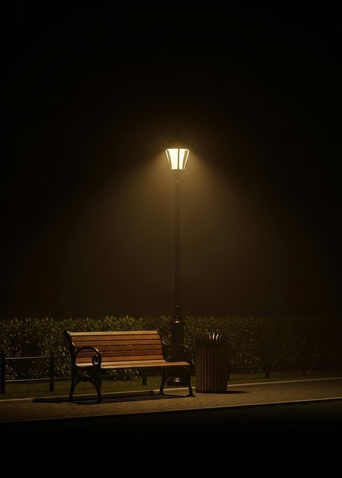 Park bench under a street lamp