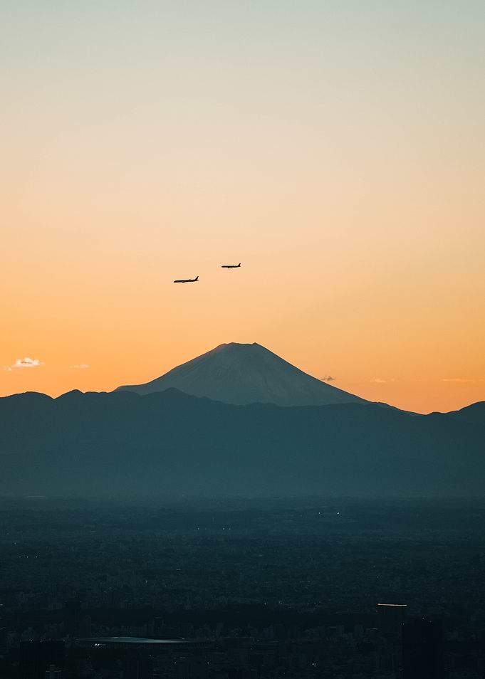 Mount Fuji with Airplanes at Sunset