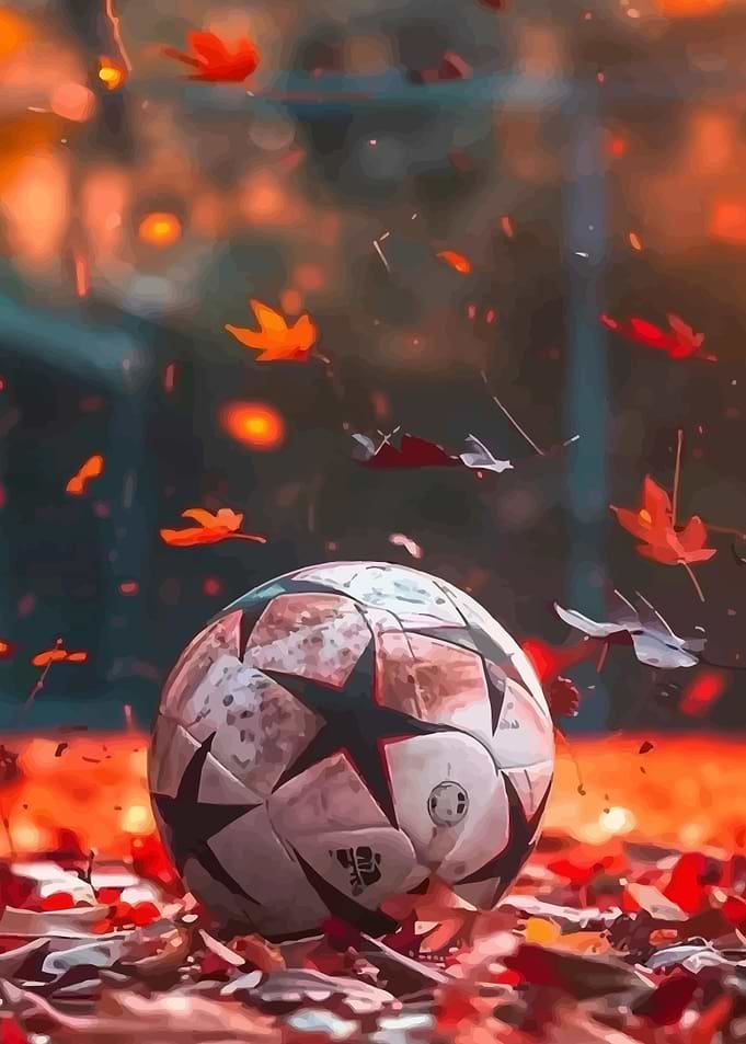 Soccer ball with falling autumn leaves