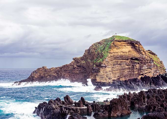 Island Rock Formation with Ocean Waves