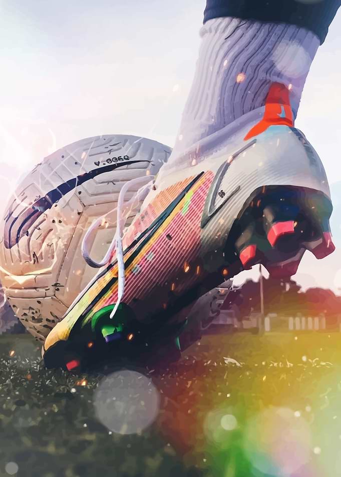 Soccer ball under a cleated shoe