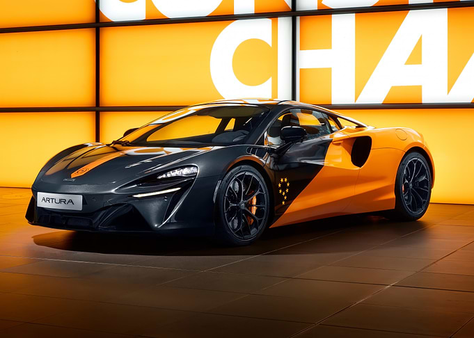 mclaren artura: black and orange