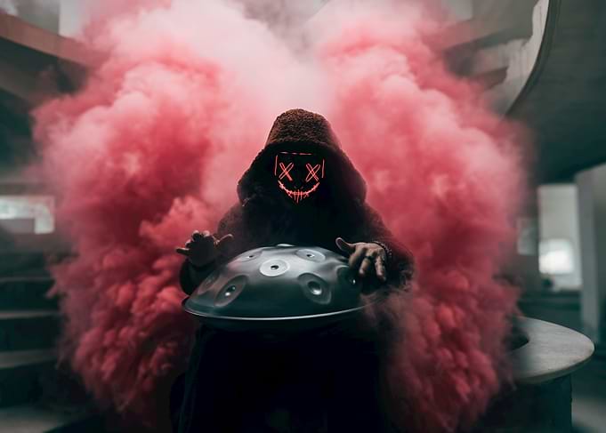Masked Musician with Handpan and Smoke
