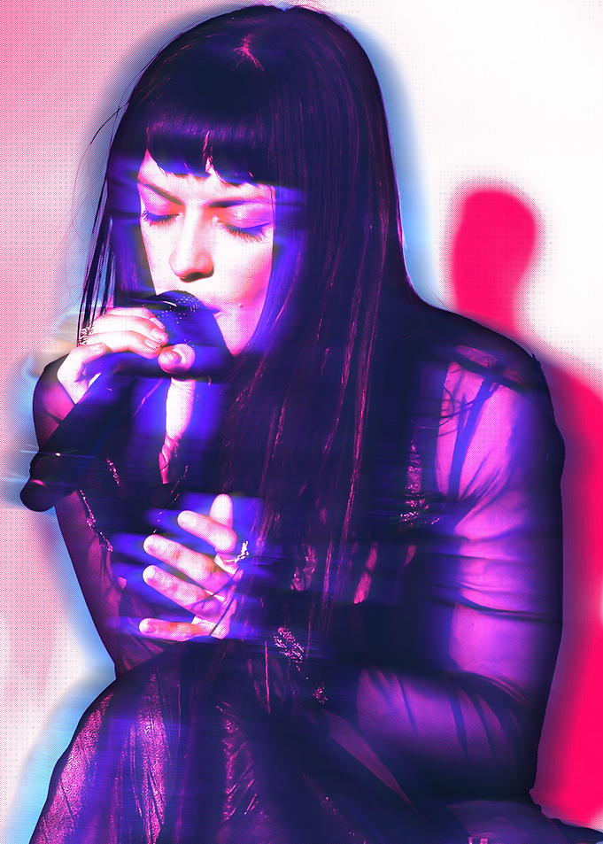 Maria Zardoya - The Marias with microphone, neon lighting effect