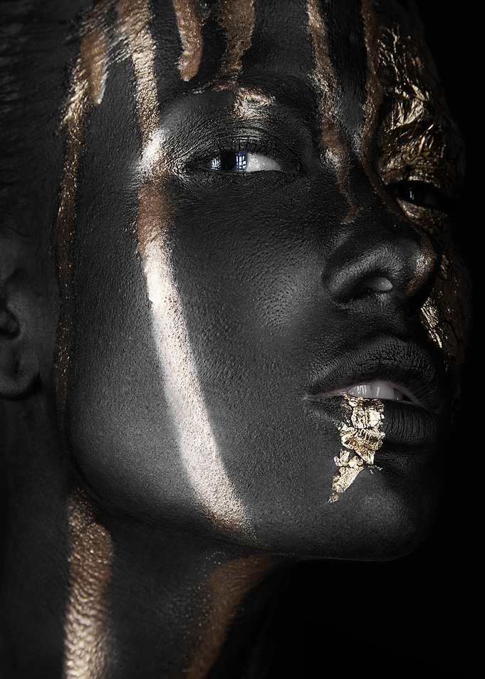 Woman with Black and Gold Body Paint