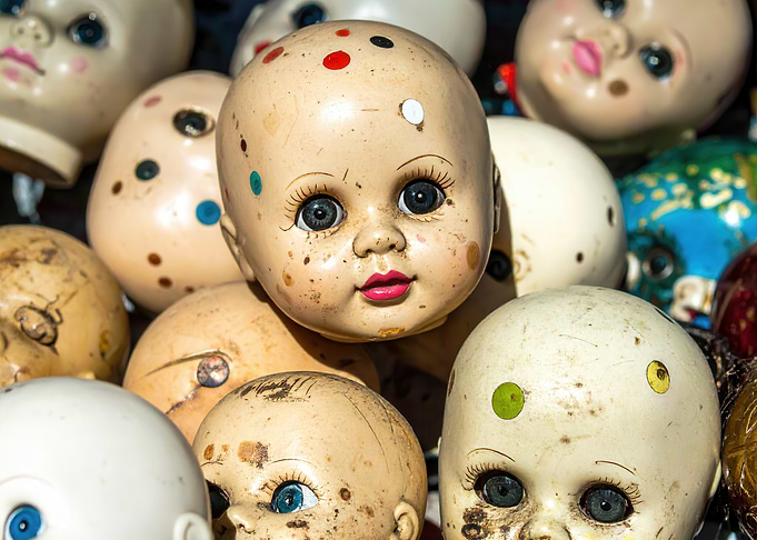 Pile of Vintage Doll Heads