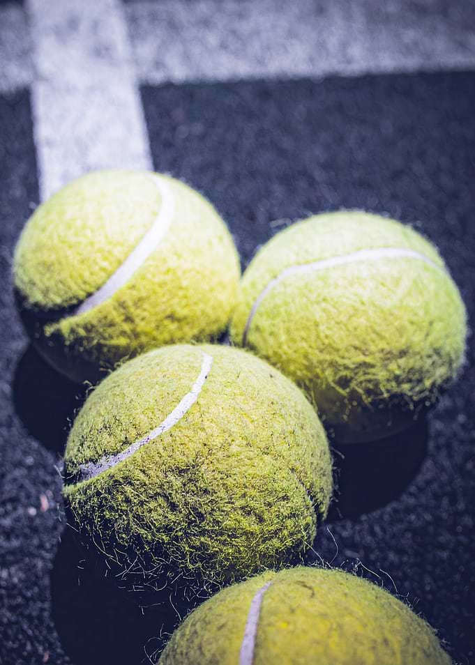 Tennis Balls on Court Close-Up