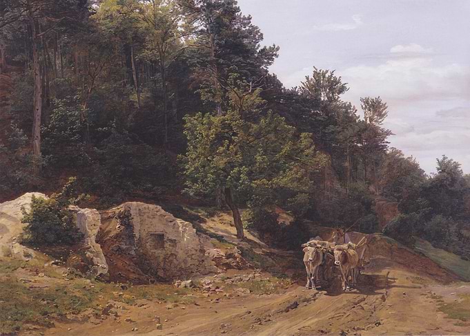 Ox-drawn cart on a dirt road